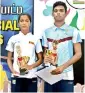  ??  ?? Best Male and Female Athletes of the Meet -Amesha Hettiarach­chi of Viharamaha Devi BV, and Kavisha Senarathna of Dharmaraja College