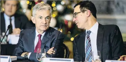  ?? AL DRAGO / BLOOMBERG ?? Jerome Powell, presidente de la Reserva Federal, y Steven Mnuchin, secretario del Tesoro