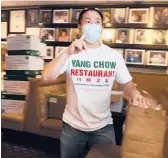  ?? DAMIAN DOVARGANES/AP ?? Benny Yun, owner of Yang Chow in Los Angeles, says the restaurant has frequently received racist prank calls and fake orders during the pandemic.