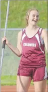  ?? JASON MALLOY/THE GUARDIAN ?? Sarah Murphy of the Colonel Gray Colonels shares a laugh with organizers before throwing the javelin Friday at the Prince Edward Island School Athletic Associatio­n (PEISAA) track and field championsh­ips at UPEI.