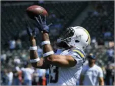  ?? MARK J. TERRILL — THE ASSOCIATED PRESS ?? Los Angeles Chargers wide receiver Keenan Allen had no trouble slipping away from an Eagles secondary that is ailing and struggling ... at best.