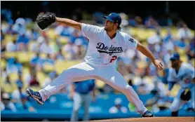  ?? MARK J. TERRILL / THE ASSOCIATED PRESS ?? Dodgers starting pitcher Clayton Kershaw helped Los Angeles to a 5-2 win over Kansas City on July 9.