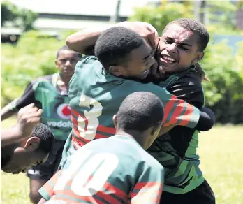  ?? Photo: Ronald Kumar ?? Anthony Bolawaqa of Assemblies of God High School maintains possession during the Fiji Secondary SchoolS rugby league on March 17, 2018.