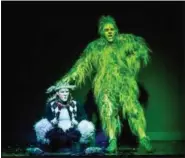  ??  ?? The Grinch’s companion, Max the Dog, narrates “Dr. Seuss’ ‘How the Grinch Stole Christmas! The Musical.”