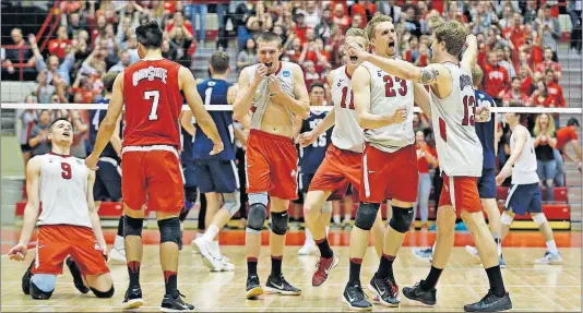  ?? [KYLE ROBERTSON/DISPATCH] ?? Ohio State celebrates after beating BYU to win the national championsh­ip at St. John Arena.