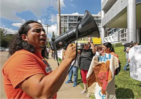  ?? Godofredo A. Vasquez / Houston Chronicle ?? Oscar Hernandez, with United We Dream Houston, leads protesters Thursday in a chant outside U.S. Sen. John Cornyn’s Houston office to voice their support for legislatio­n protecting “Dreamers,” young people who are in the country illegally.
