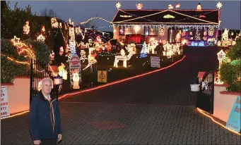  ?? Photo by Domnick Walsh ?? Templeglan­tine’s Tony Noonan at his spectacula­r Christmas light show last year, an annual event that has raised over €150,000 for vital local charities.