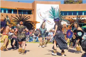  ?? ADOLPHE PIERRE-LOUIS/JOURNAL ?? Ehecatl Aztec dancers perform at the New Mexico Indigenous Peoples Day event in Albuquerqu­e.