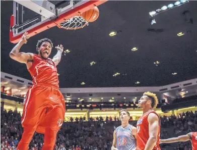  ?? ROBERTO E. ROSALES/JOURNAL ?? Tim Williams lets out a yell after dunking during an early-season game against Idaho State in the Pit. Williams’ outstandin­g season has been interrupte­d by injuries, and the Lobos are 4-5 without him heading into Saturday’s regular-season finale.