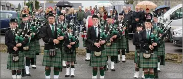  ??  ?? St Coleman’s Pipe Band performing at the opening of Ballindagg­in Community Park.