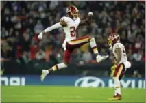  ?? MATT DUNHAM — THE ASSOCIATED PRESS FILE ?? Redskins cornerback Josh Norman (24) celebrates a turnover during a game last year against the Bengals, in London, England.
