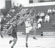  ?? JOHN MCCALL/SOUTH FLORIDA SUN SENTINEL ?? Wellington’s William Van Hook drives for a layup against Village Academy’s Zeph Bennett on Friday.