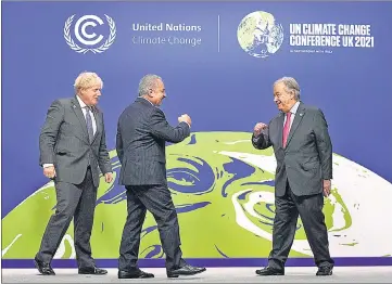  ?? ?? British PM Boris Johnson (left) and UN secretary-general Antonio Guterres greet Palestine’s Prime Minister Mohammad Shtayyeh (centre) during arrivals at the COP26 UN Climate Summit in Glasgow, Scotland.