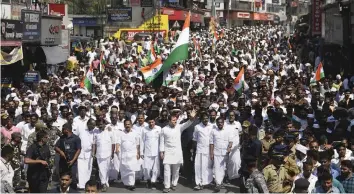  ?? — PTI ?? Congress leader Rahul Gandhi and party leaders during the ‘Save the Constituti­on’ march at Kalpetta in Wayanad on Thursday.