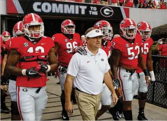  ?? BOB ANDRES / BANDRES@AJC.COM ?? Kirby Smart has coached the Bulldogs to a 7-0 start. “He could win it this year,” former coach Vince Dooley says of SEC and national titles. “There’s an opportunit­y there.”