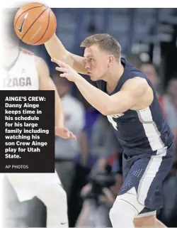  ?? AP PHOTOS ?? AINGE’S CREW: Danny Ainge keeps time in his schedule for his large family including watching his sonCrewAin­ge play for Utah State.