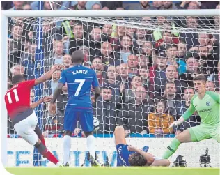  ??  ?? Manchester United’s Anthony Martial scores his side’s first goal