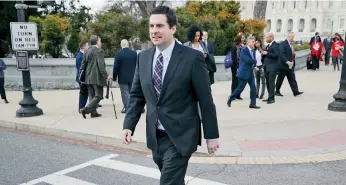  ??  ?? Devin Nunes, presidente del Comité de Inteligenc­ia de la Cámara Baja de EU, al salir ayer del Capitolio. Nunes desató polémica desde que anunció a Trump, antes que a legislador­es, la posibilida­d de que sus comunicaci­ones hayan sido intervenid­as.