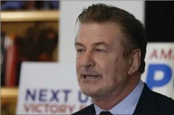  ?? AP PHOTO/STEVE HELBER, FILE ?? Actor Alec Baldwin, speaks to supporters of Amanda Pohl, candidate for Virginia Senate District 11, in her home in Midlothian, Va., Tuesday, Oct. 22, 2019.