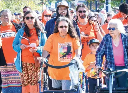  ?? MARK BRETT / Local Journalism Initiative ?? Orange shirts abound at organized walk along the waterfront in Penticton marking the National Day of Truth and Reconcilia­tion Walk for the Children, a day created to raise awareness and contemplat­ion of past injustices.