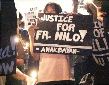  ?? — Longino Pamintuan/HAU Intern ?? SEEKING JUSTICE. Students rise up and seek justice for Father Richmond Nilo’s death and oppose human rights violations at Holy Angel University over the weekend.