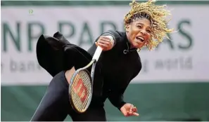  ?? Picture: JULIAN FINNEY/GETTY IMAGES ?? EASIER ON HERSELF: Serena Williams of the US serves during her first round match against Kristie Ahn, also of the US, on day two of the 2020 French Open on Monday at Roland Garros, in Paris. Williams was the winner.