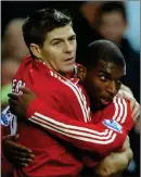  ??  ?? Ryan Babel, right, at Liverpool