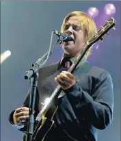  ?? Bruno Ferrandez
AFP/Getty Images ?? PAUL BANKS, shown in France in 2005, and his Interpol band mates take the Coachella stage Friday.