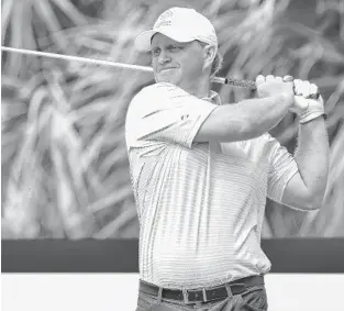  ?? JENNIFER LETT/SUN SENTINEL PHOTOS ?? Gary Nicklaus, in his PGA Tour Champions debut, hits a drive during the Oasis Championsh­ip on Friday.