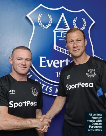  ?? GETTY IMAGES ?? All smiles: Rooney meets with Duncan Ferguson