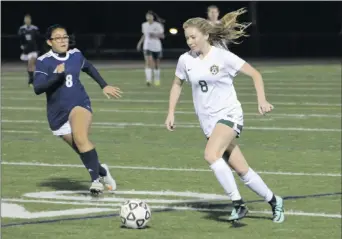  ?? Haley Sawyer/The Signal ?? Canyon girls soccer’s Shelby Cooper maintains control of the ball against Lancaster on Tuesday at Canyon. Cooper was one of the eight players to score in the win.
