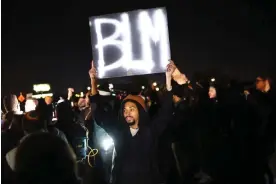  ?? Photograph: Scott Olson/Getty Images ?? Demonstrat­ors in Memphis, Tennessee, block traffic while protesting the death of Tyre Nichols on 27 January.