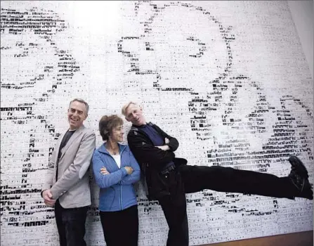  ?? Bob Chamberlin ?? DIRECTOR Steve Martino, left, with Jeannie Schulz — widow of comic strip creator Charles M. Schulz — and son Craig.