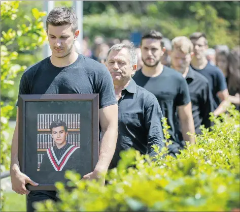  ?? ARLEN REDEKOP/PNG ?? Friends and family of fatal stabbing victim Luka Gordic attend a bail hearing at B.C. provincial court Wednesday for three teens charged in the slaying over the Victoria Day long weekend.