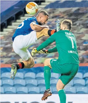  ??  ?? RED CARD: The Kemar Roofe challenge on Ondrej Kolar that saw the striker sent off.