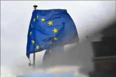  ?? Geert Vanden Wijngaert/Bloomberg ?? A European Union flag flies in Brussels on Oct. 7.