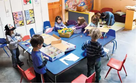  ?? CLYDE MUELLER/THE NEW MEXICAN ?? Children work in Anna Fonti Connell’s prekinderg­arten class Tuesday at Little Earth School. The State of Preschool Yearbook said New Mexico increased its spending on early childhood education programs by 29 percent between fiscal year 2015 and 2016, to...