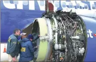  ?? NTSB VIA REUTERS ?? Investigat­ors exam damage to the engine of a Southwest Airlines plane in Philadelph­ia on Tuesday.
