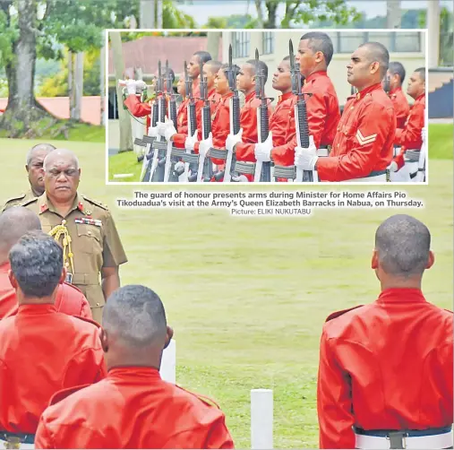  ?? Picture: ELIKI NUKUTABU ?? The guard of honour presents arms during Minister for Home Affairs Pio Tikoduadua’s visit at the Army’s Queen Elizabeth Barracks in Nabua, on Thursday.
Constituti­on as rule book