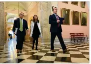  ??  ?? Gov. Mike DeWine, Ohio Department of Health Director Amy Acton and Lt. Gov. Jon Husted leave a daily press briefing on coronaviru­s at the Ohio Statehouse.