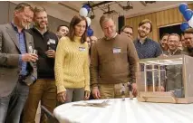  ?? Paramount Pictures ?? Kristen Wiig and Matt Damon, center, star in the very literally named “Downsizing.”