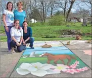  ??  ?? Artists and city officials stand beside one of the works of art from the March 18 pop-up event. Clockwise from top left: Fort Oglethorpe City Council member Paula Stinnett, artist Durinda Cheek, Fort Oglethorpe City Manager Jennifer Payne-Simpkins, and...