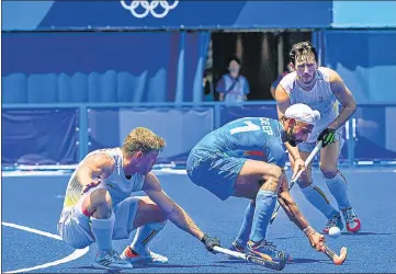  ??  ?? India's Mandeep Singh tries to control the ball during their semifinal against Belgium on Tuesday.
