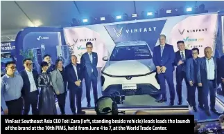  ?? ?? Vinfast Southeast Asia CEO Toti Zara (left, standing beside vehicle) leads leads the launch of the brand at the 10th PIMS, held from June 4 to 7, at the World Trade Center.