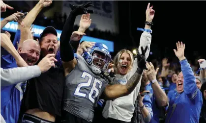  ?? Photograph: Gregory Shamus/Getty Images ?? Jahmyr Gibbs celebrates his touchdown with Detroit Lions fans during their Monday Night Football win over the Las Vegas Raiders.