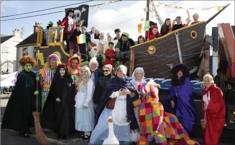  ??  ?? Members of New Ross Pantomime Society at the New Ross parade last year.