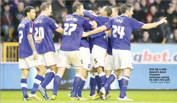  ?? PICTURE: Action Images ?? GIVE ME A HUG: Ipswich’s Aaron Cresswell celebrates scoring his side’s first goal