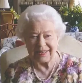  ?? BUCKINGHAM PALACE / AFP VIA GETTY IMAGES ?? Britain’s Queen Elizabeth addressed 24-million people in her first public Zoom meeting on Thursday.