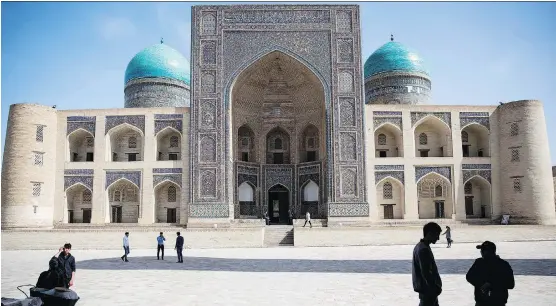  ?? PHOTOS: TAYLOR WEIDMAN/BLOOMBERG ?? The Mir-i-Arab Madrasa in Bukhara, Uzbekistan, a fantasy destinatio­n for architectu­re enthusiast­s who will revel in still-standing ancient cities.