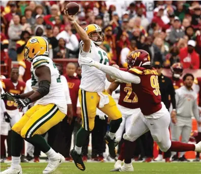  ?? GETTY IMAGES ?? Aaron Rodgers has been ineffectiv­e during the Packers’ three-game skid, but he embraces being an underdog.